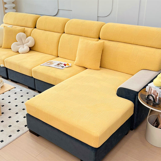 Yellow sectional sofa with gray accents in a living room setting